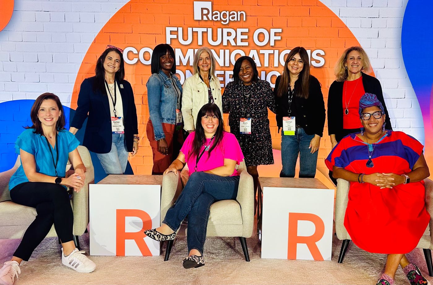 Holly Subervi seated center with fellow communicators on stage at Ragan's Future of Communications Conference